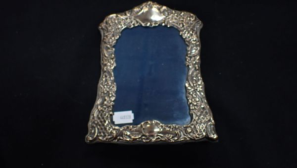 A SILVER FRONTED PHOTOGRAPH FRAME