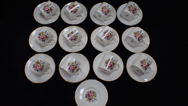 TWELVE ROYAL WORCESTER COFFEE CANS AND SAUCERS