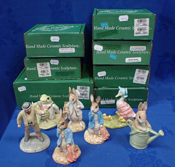 A COLLECTION OF ROYAL DOULTON AND BESWICK BEATRIX POTTER FIGURINES