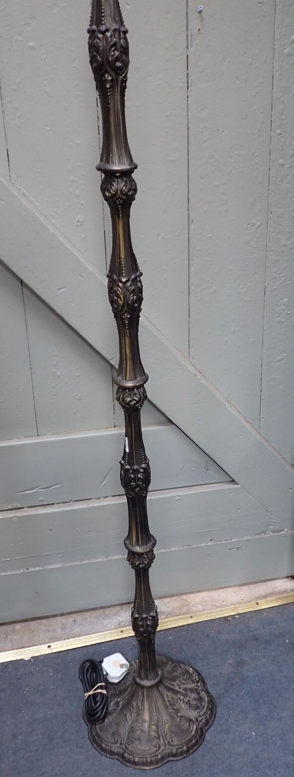 A  CAST METAL STANDARD LAMP