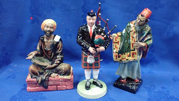 A ROYAL DOULTON 'THE PIPER' MODELLED BY PETER A GEE FIGURE