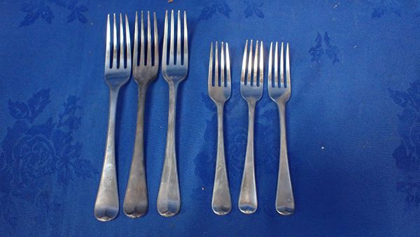 THREE GEORGE III SILVER OLD ENGLISH PATTERN DINNER AND TABLE FORKS