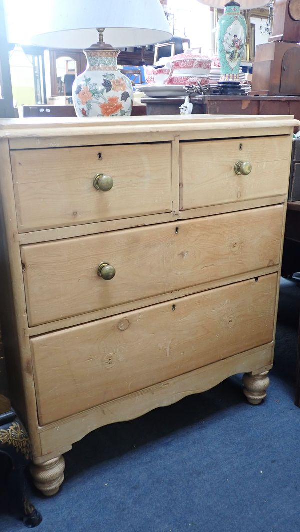 A VICTORIAN STRIPPED PINE CHEST OF DRAWERS