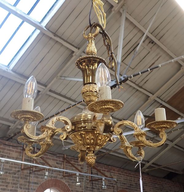 A CAST BRASS SIX BRANCHED CHANDELIER