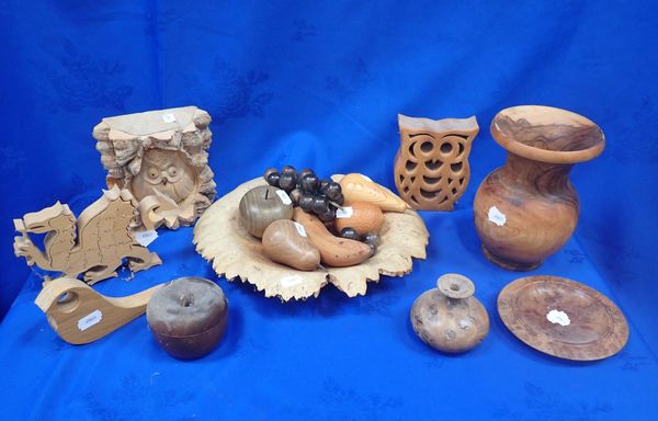 A CARVED WOODEN BOWL WITH A COLLECTION OF CARVED FRUIT