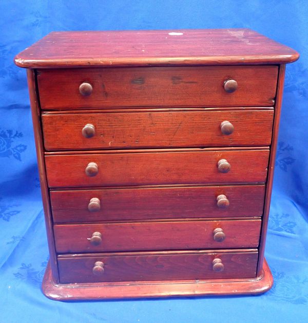 A VICTORIAN COLLECTOR'S CHEST OF DRAWERS