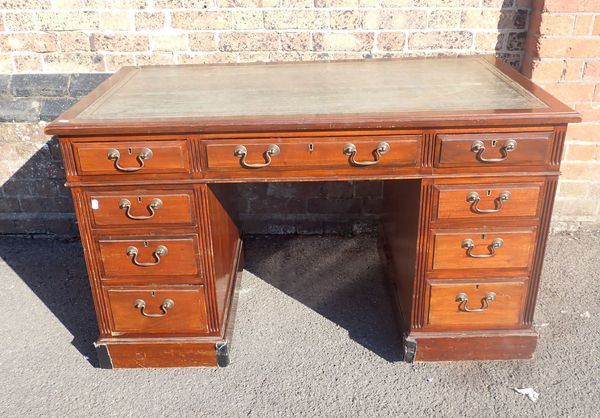 AN EDWARDIAN PEDESTAL DESK