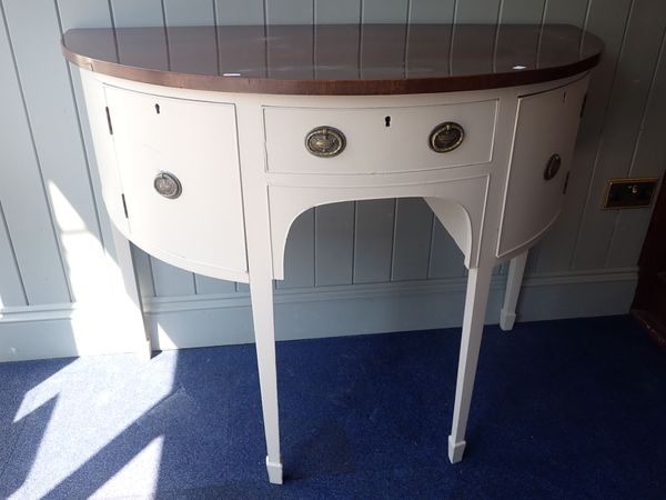 A GEORGE II STYLE DEMI-LUNE SIDEBOARD