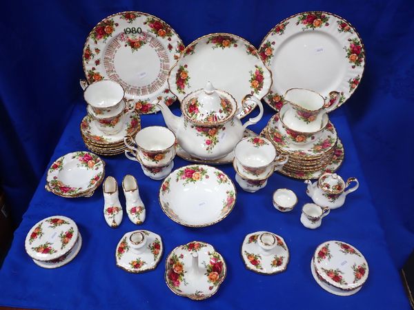 A ROYAL ALBERT COUNTRY ROSES TEA SET FOR SIX