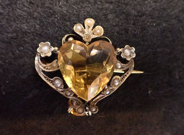 A CITRINE AND SEED PEARL HEART SHAPED BROOCH