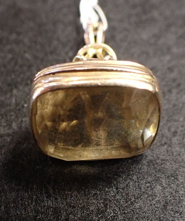 AN EARLY 20TH CENTURY CITRINE AND GOLD FOB