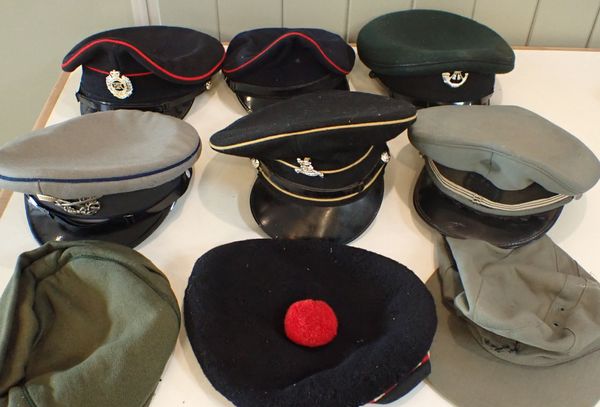 A COLLECTION MILITARY HATS AND CAPS