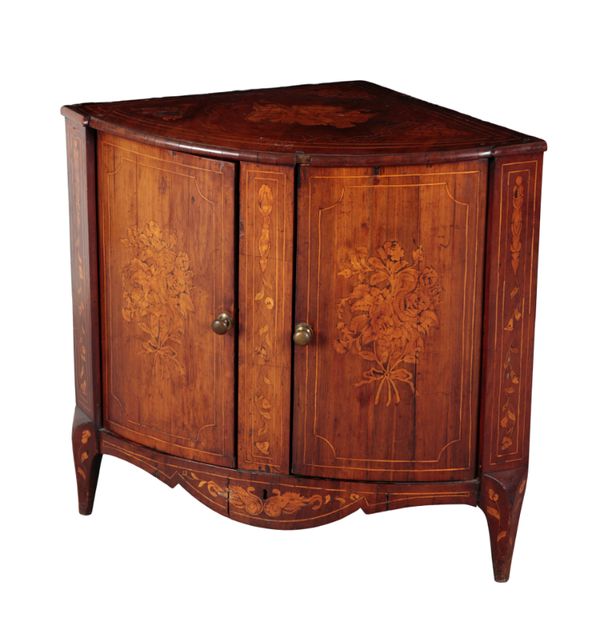 AN 18TH CENTURY CONTINENTAL WALNUT AND MARQUETRY BOW-FRONT CORNER CUPBOARD