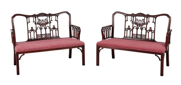 A PAIR OF 'CHINESE CHIPPENDALE' MAHOGANY SETTEES