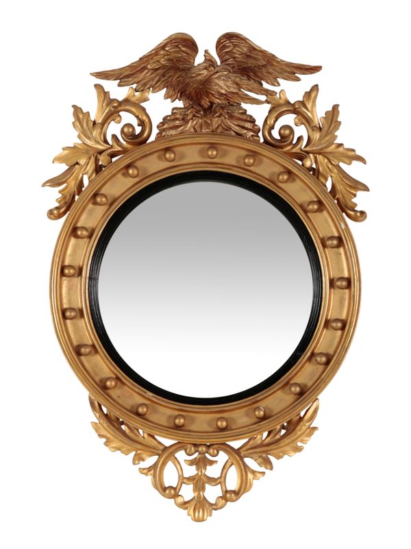 A REGENCY STYLE, GILTWOOD & COMPOSITION CONVEX MIRROR