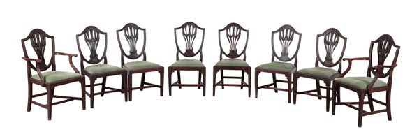 A SET OF EIGHT MAHOGANY DINING CHAIRS IN THE MANNER OF GEORGE HEPPLEWHITE