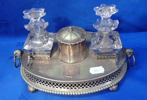 A SILVER-PLATED OVAL INKSTAND