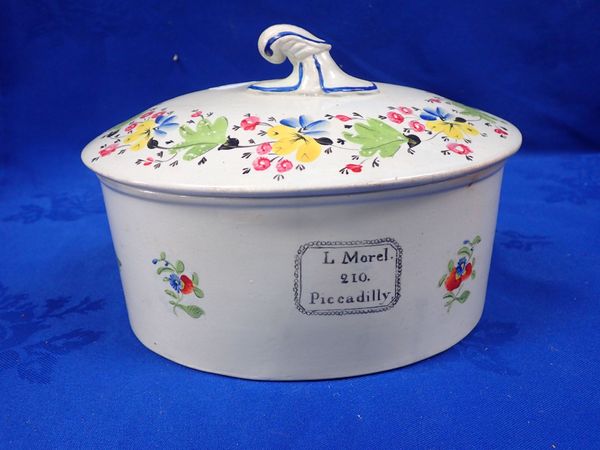 A CREAMWARE/PEARLWARE COVERED PATE DISH