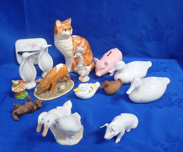 A COLLECTION OF CERAMIC BIRDS AND ANIMALS