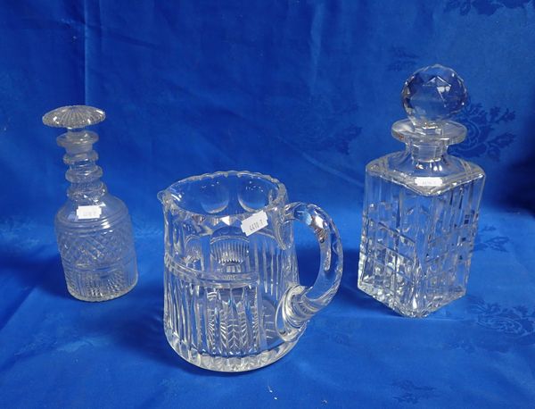 TWO CUT-GLASS DECANTERS AND A CUT GLASS JUG