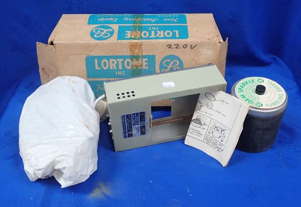 A LORTONE LAPIDIARY ROCK TUMBLER