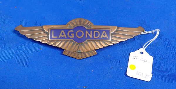 A VINTAGE LAGONDA CAR BADGE