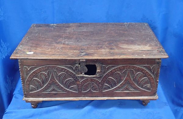 AN OAK TABLE BOX, WITH CARVED FRONT