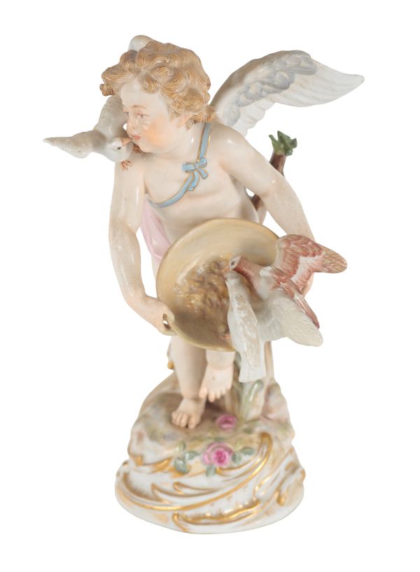 A LATE 19TH CENTURY MEISSEN PORCELAIN FIGURE OF CUPID