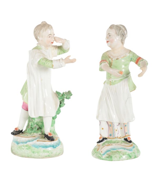 TWO VERY SIMILAR 18TH CENTURY DUESBURY & CO DERBY PORCELAIN FIGURES - GIRL & BOY