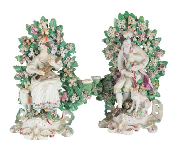 A PAIR OF 18TH CENTURY DUESBURY & CO DERBY PORCELAIN CANDLESTICKS