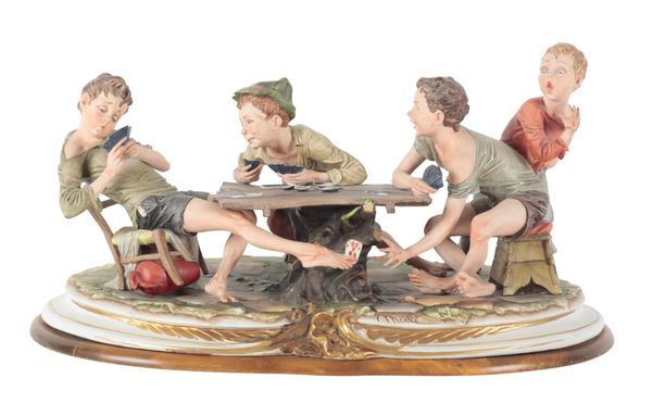 A CAPODIMONTE FIGURE - 'THE CARD CHEATS'