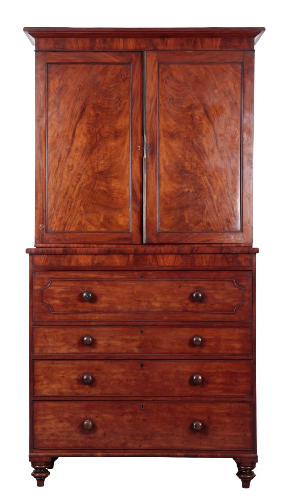 AN EARLY VICTORIAN MAHOGANY SECRETAIRE BOOKCASE