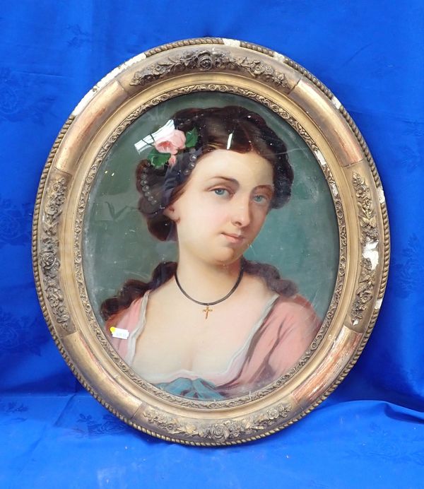 A 19TH CENTURY REVERSE PAINTING OF A YOUNG WOMAN