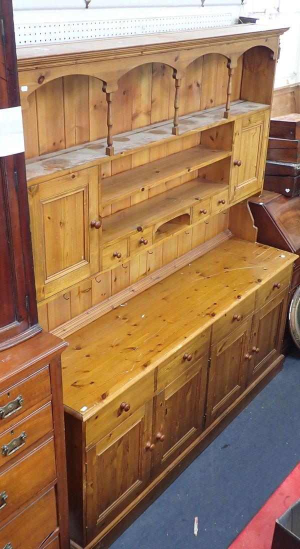 A PINE DRESSER OF TRADITIONAL STYLE