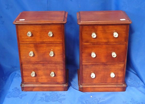 A PAIR OF VICTORIAN APPRENTICE MAHOGANY MINIATURE CHEST OF DRAWERS