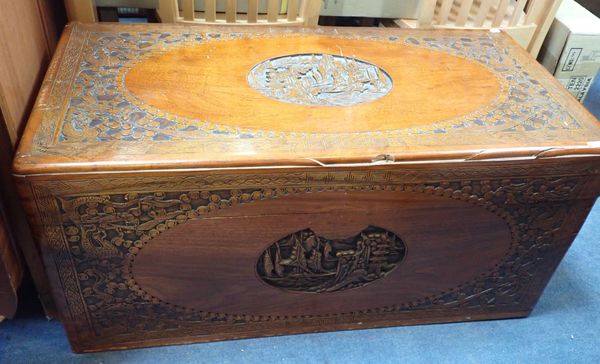 A CHINESE CARVED CAMPHOR WOOD CHEST