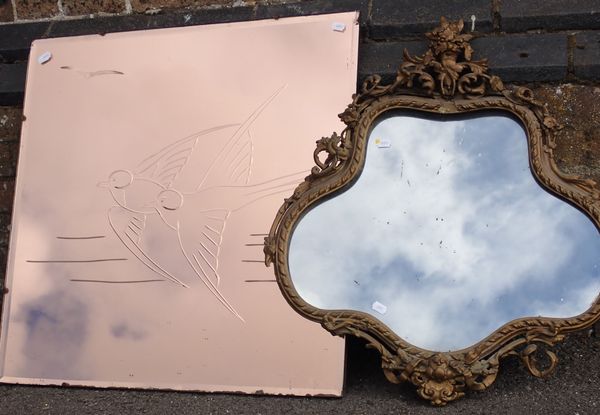 A ROCOCO STYLE GILT GESSO MIRROR