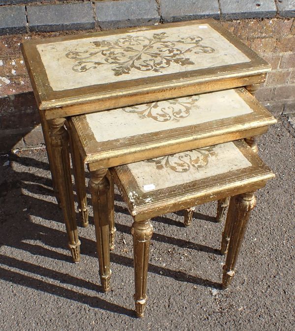 A FLORENTINE GILT AND PAINTED WOOD NEST OF TABLES