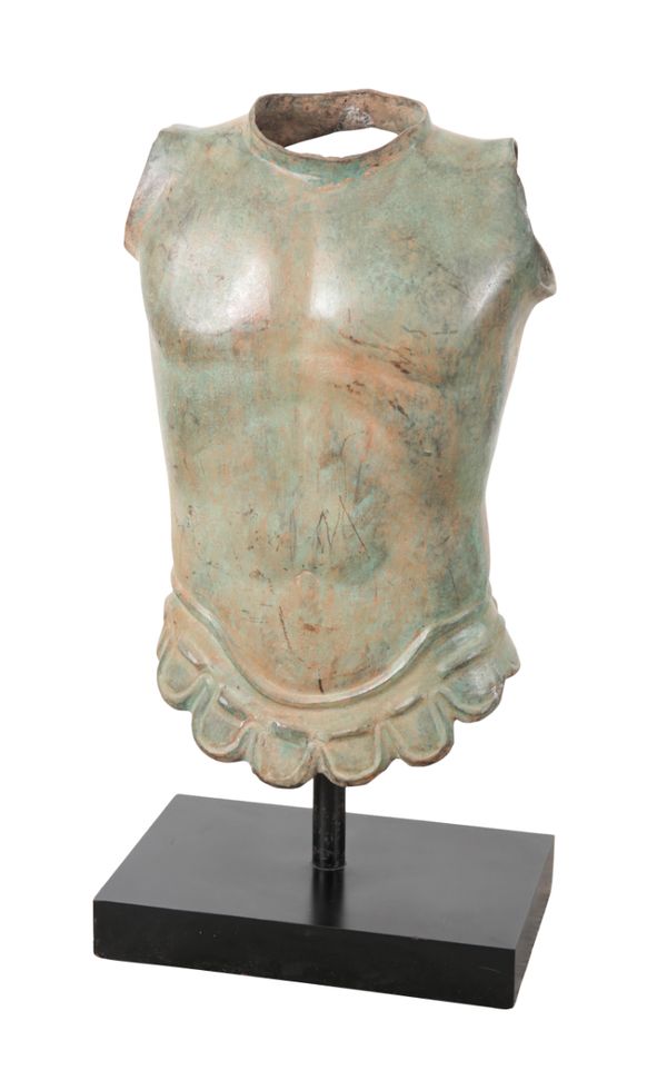 A CAST METAL ROMAN CUIRASS ON STAND