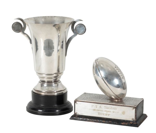 A SILVER PLATED RUGBY TROPHY