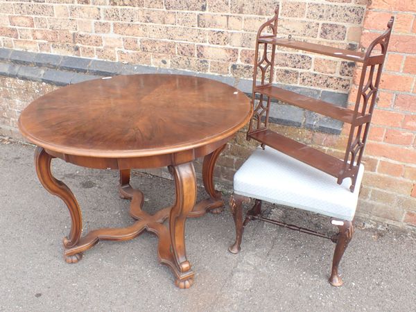 A CONTINENTAL WALNUT CENTRE TABLE