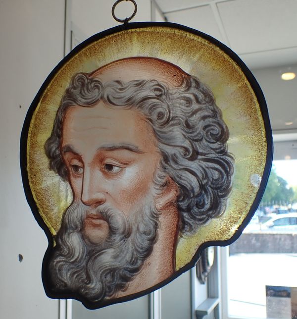 A STAINED GLASS FRAGMENT, A SAINT'S HEAD
