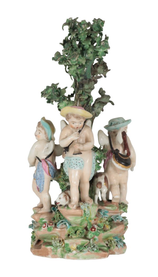 AN 18TH CENTURY DUESBURY & CO DERBY PORCELAIN FIGURE GROUP OF THREE CUPIDS