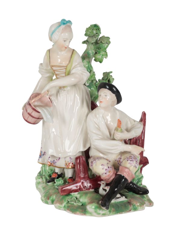AN 18TH CENTURY DUESBURY & CO DERBY PORCELAIN FIGURE GROUP - A COUNTRY COUPLE