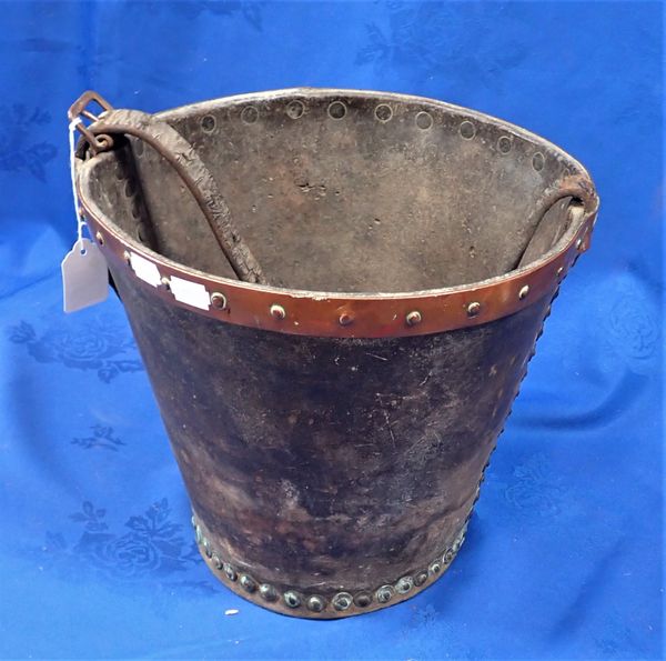 A COPPER MOUNTED LEATHER BUCKET