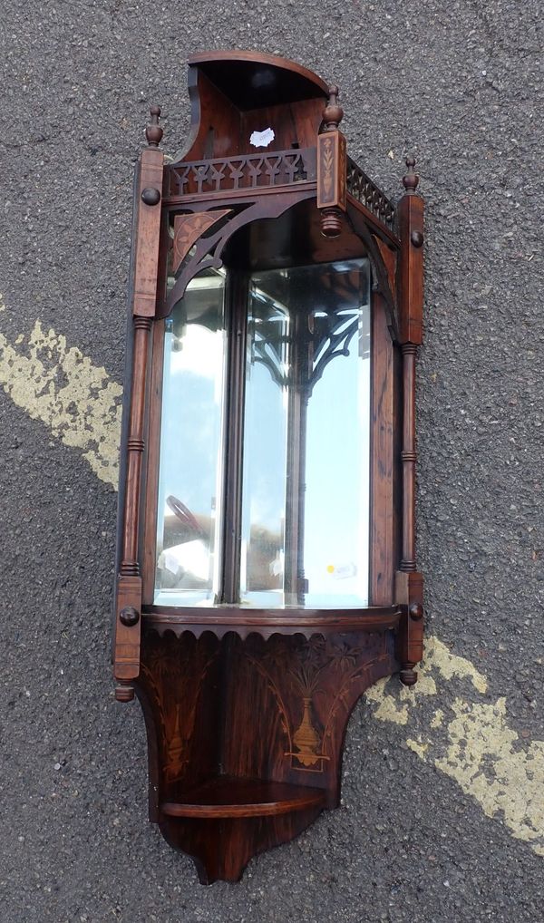 A LATE VICTORIAN ROSEWOOD HANGING CORNER SHELF