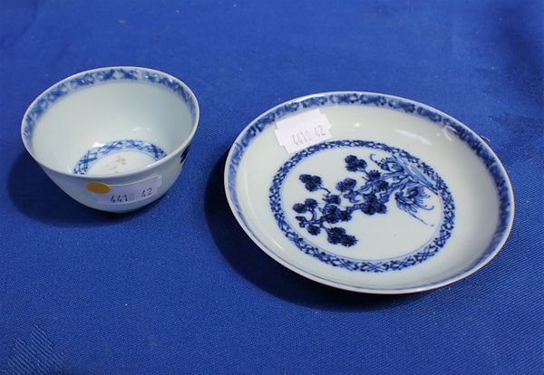 A NANKING CARGO TEABOWL AND SAUCER