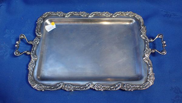 A TRAY WITH DECORATED CAST EDGE