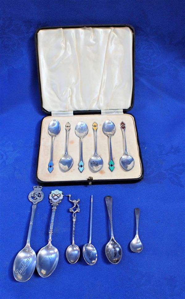 A SET OF SIX SILVER AND ENAMEL TEASPOONS