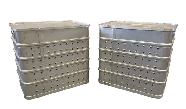 A PAIR OF ALUMINIUM LAUNDRY OR COTTON BINS